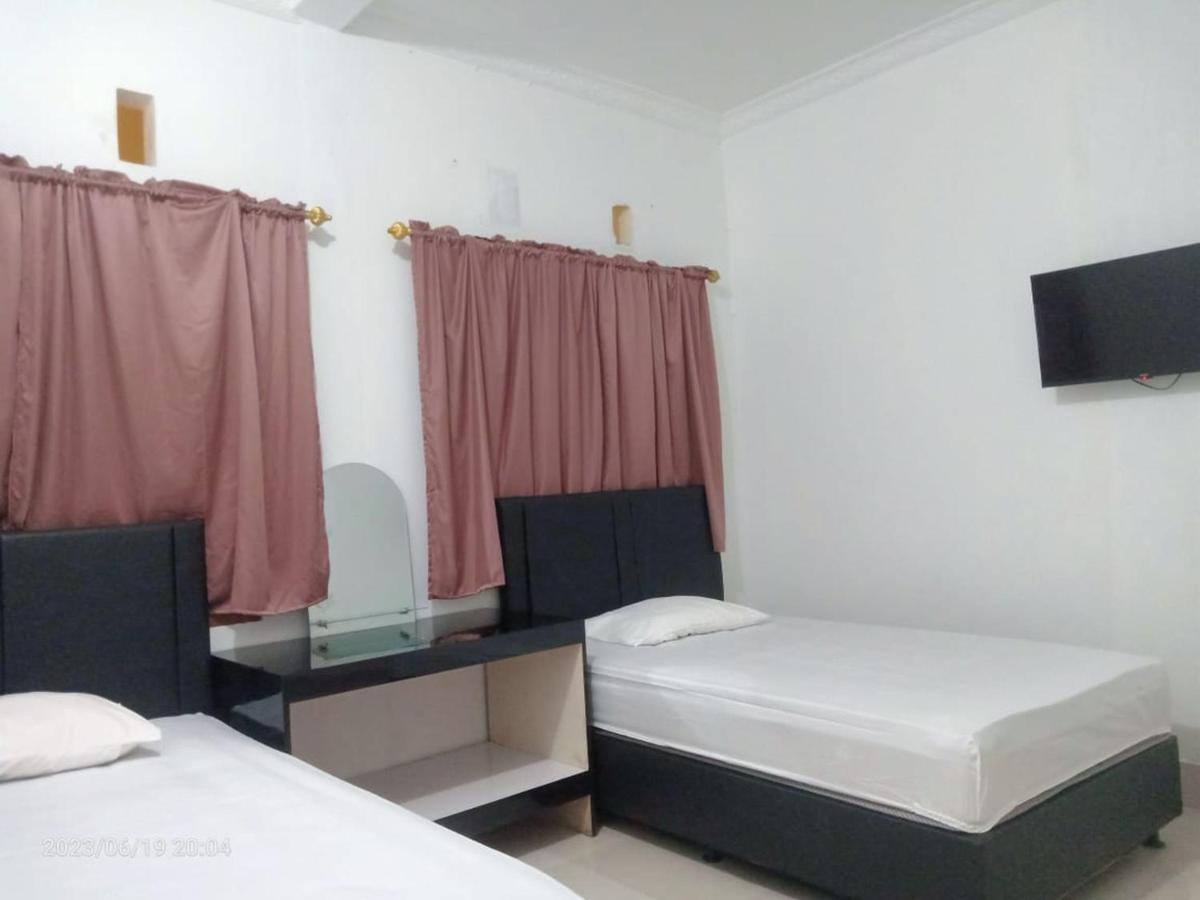 Permata Homestay Kotamobagu Mitra Reddoorz Exterior photo