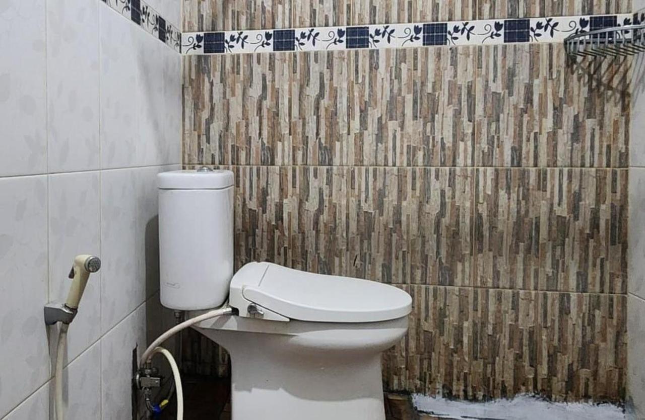 Permata Homestay Kotamobagu Mitra Reddoorz Exterior photo